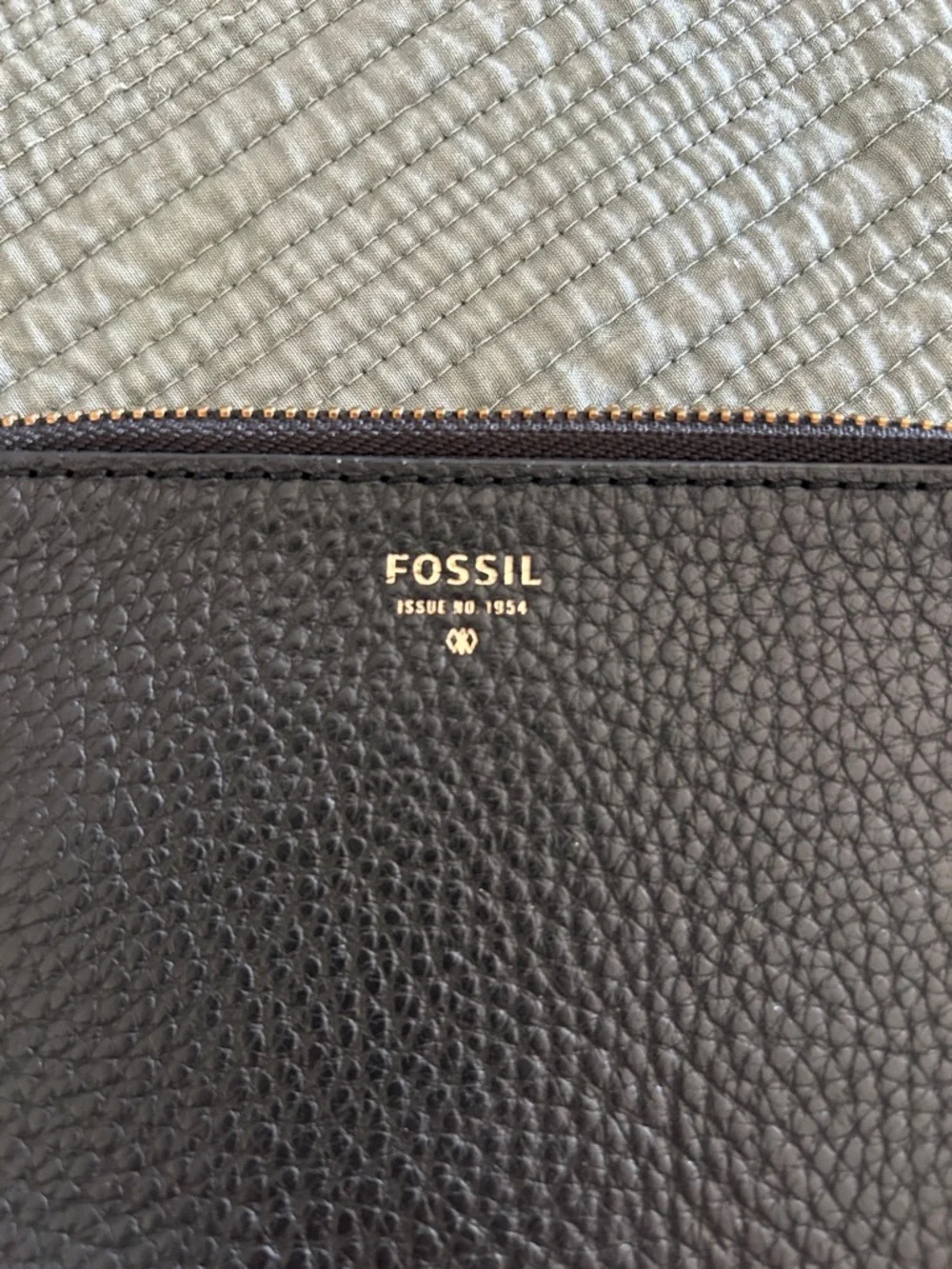 Fossil Tara Black Pebbled Leather Wristlet with Yellow Tassel Accent